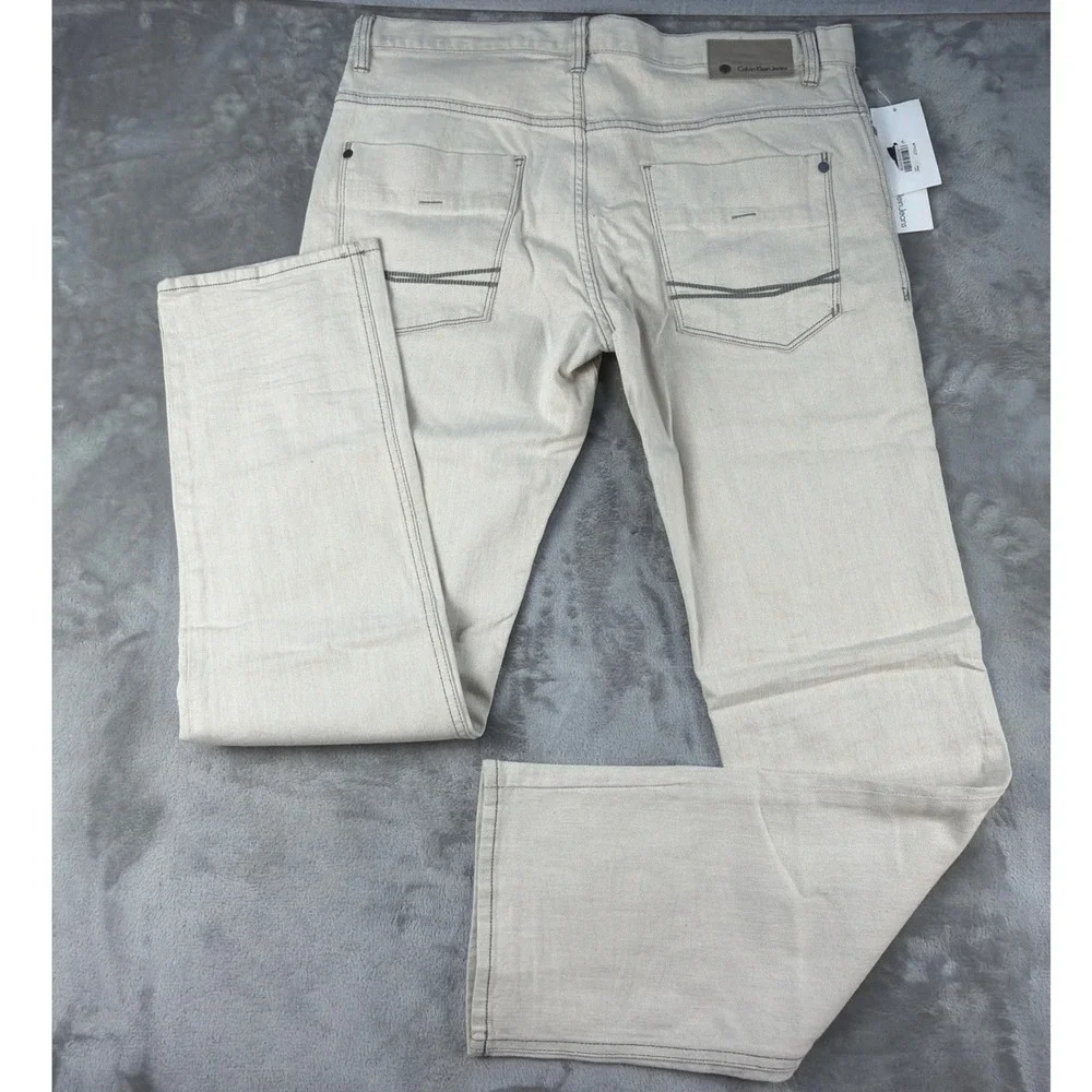 Calvin Klein Jeans Mens 34 Slim Straight Low Rise Button Fly Beige Off White NEW